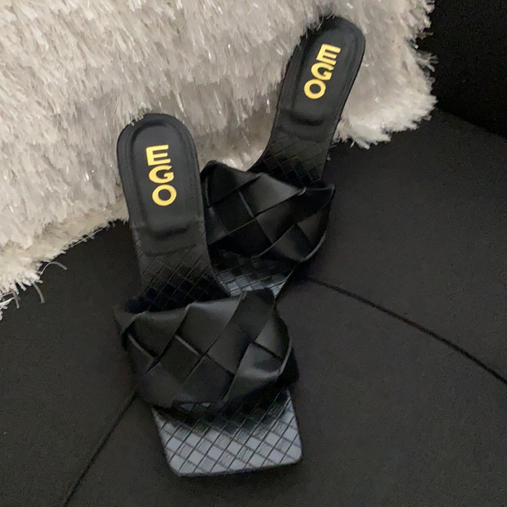 Black, 3 1/2 inch heel sandals.